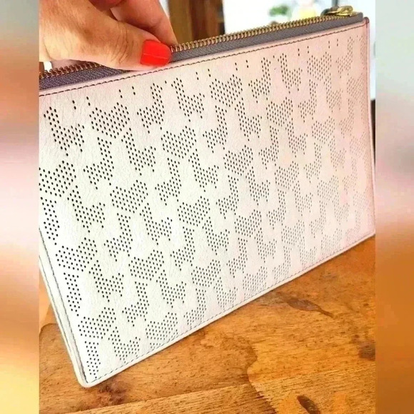 Fossil Handbags - Fossil Large Powder Pink Perferated leather clutch 9.5" NWOT